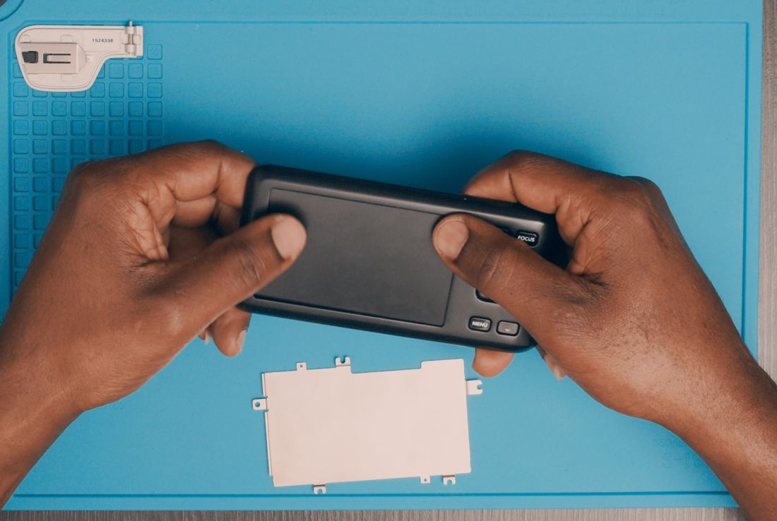 Push gently on the LCD to release it out of its seat and set it aside.